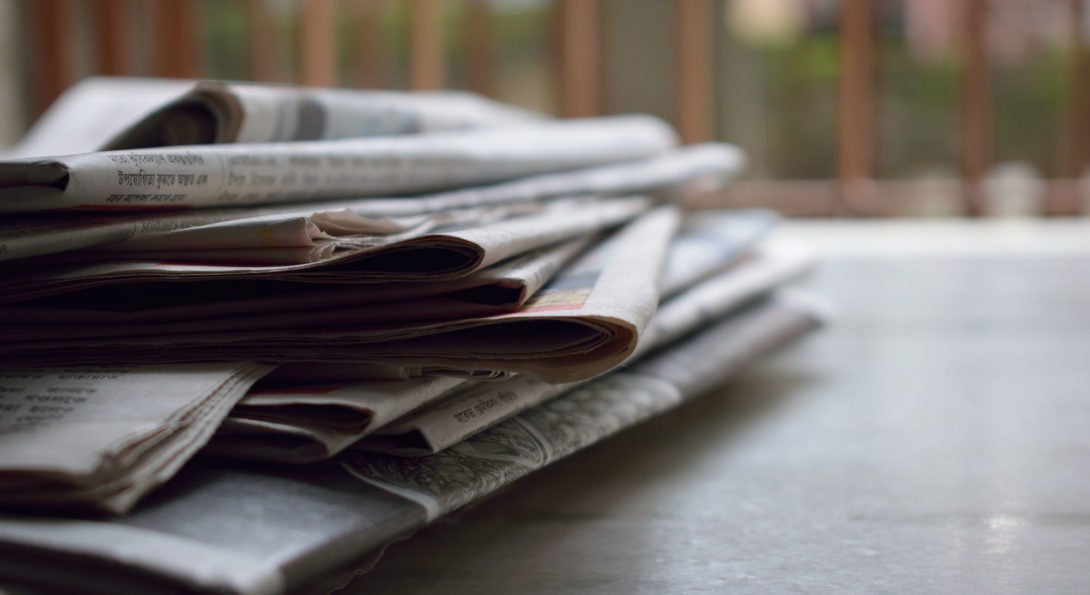 newspapers on desk